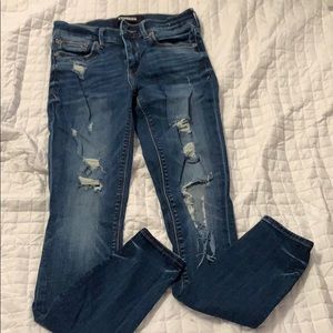 Express distressed dark wash skinny jeans